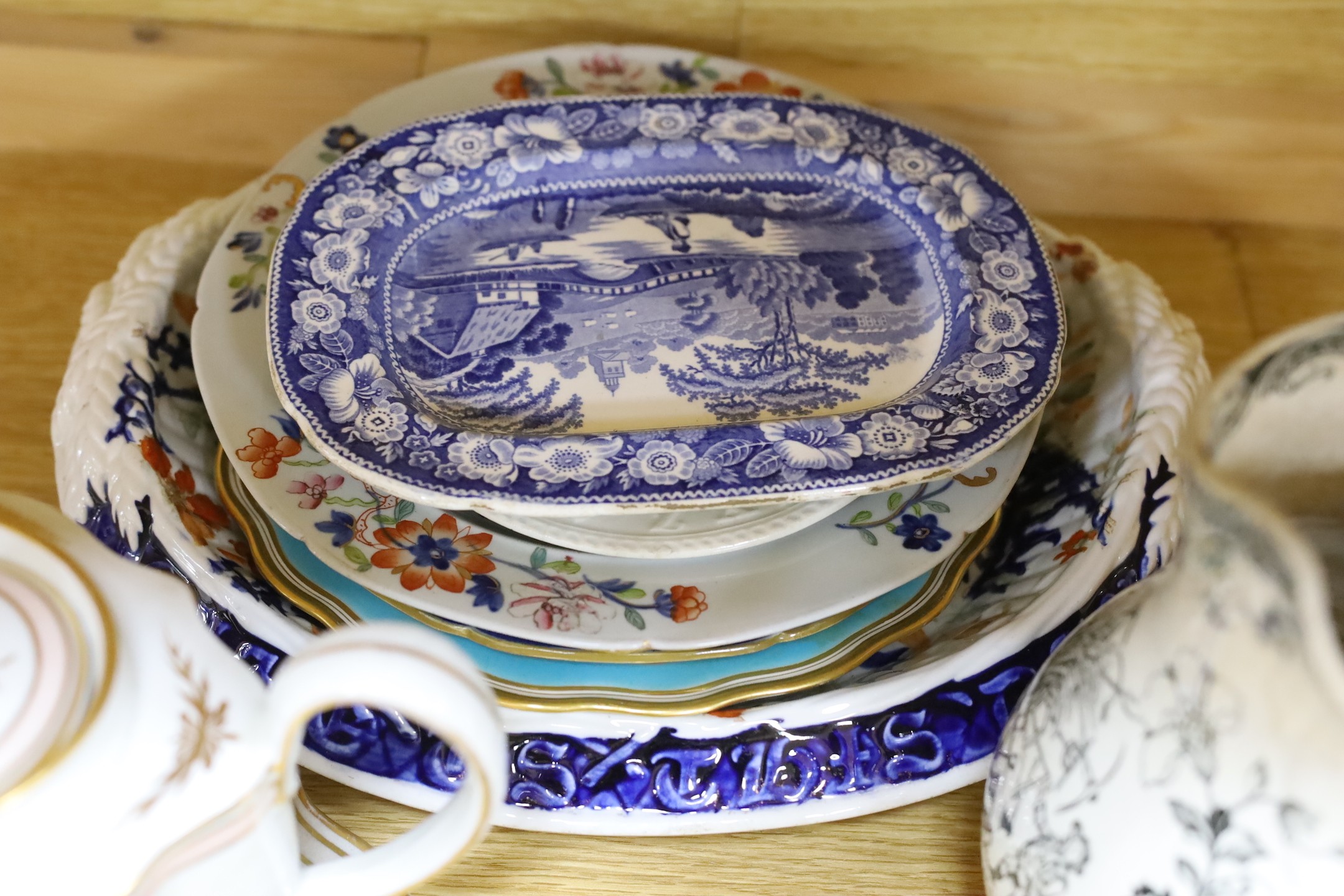 A 19th century Harvest jug and mug, a Victorian gilt tea set and mixed plates and a platter, jug 19 cms high.